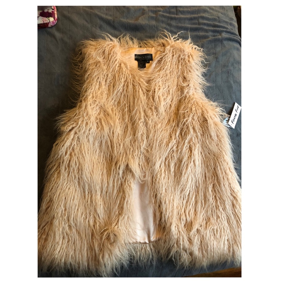 Pink furry vest